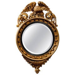 19th Century English Gilt-Wood Bull's Eye Mirror with Eagle Crest