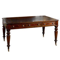 Late 19th Century English Mahogany Partner's Desk with Embossed Black Leather Top