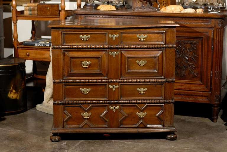 Carved English Walnut Early 19th Century Five-Drawer Chest with Geometric Front For Sale