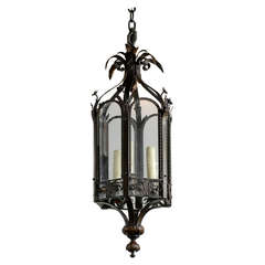 Turn of the Century French Iron Three-Light Lantern with Hexagonal Arched Frame Turn of the Century French Iron Three-Light Lantern with Hexagonal Arched Frame
