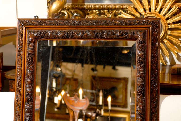 English 1880s Rectangular Mirror with Bevelled Glass and Foliage Adorned Frame 3