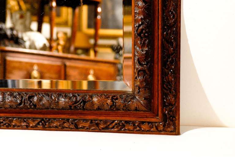 English 1880s Rectangular Mirror with Bevelled Glass and Foliage Adorned Frame 2