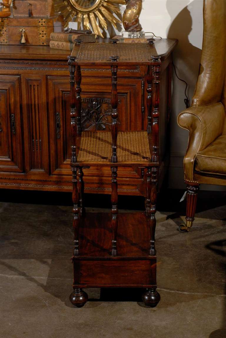 Regency trolley with 2 caned shelves and a drawer.