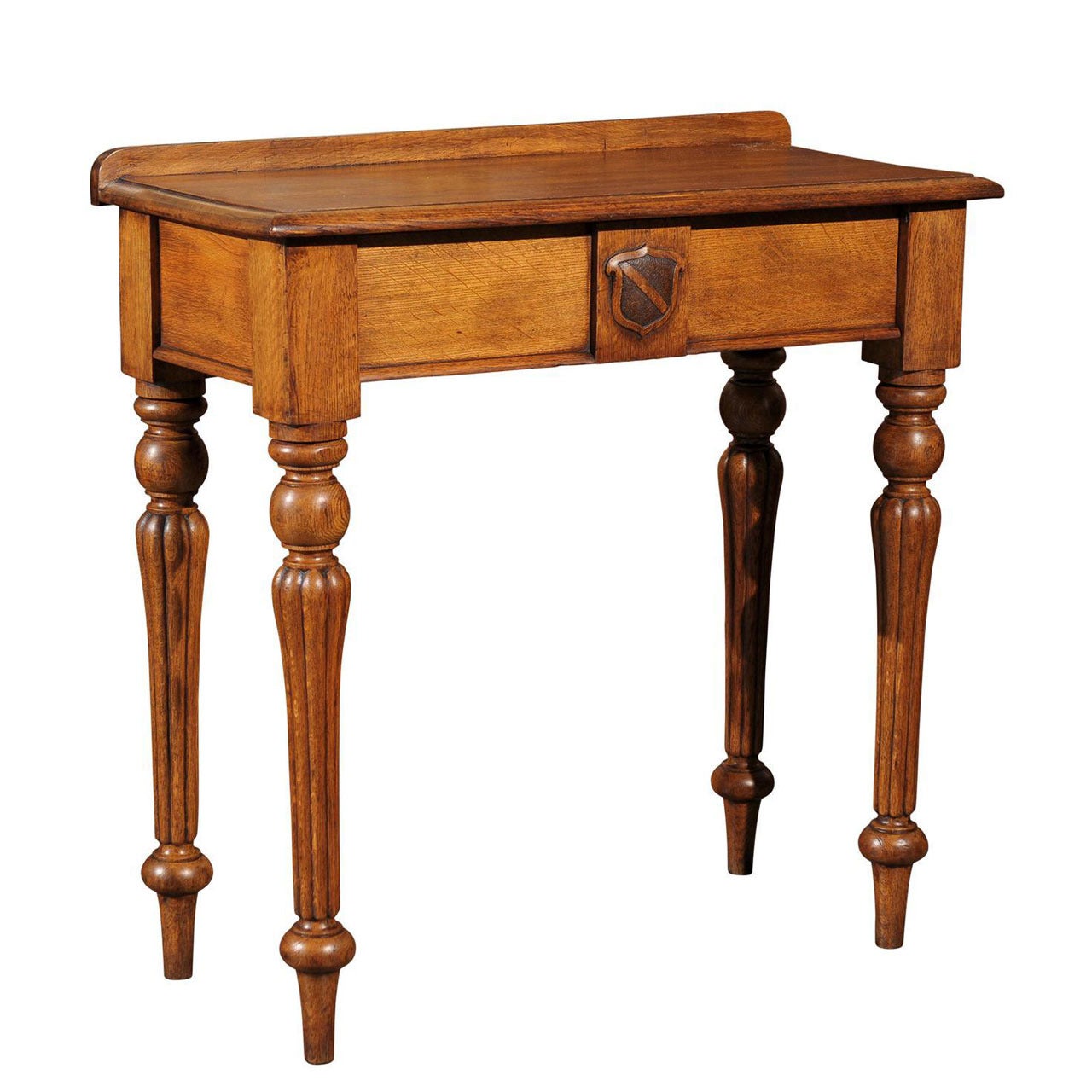 English 1880s Oak Console Table with Single Drawer, Shield Motif and Reeded Legs