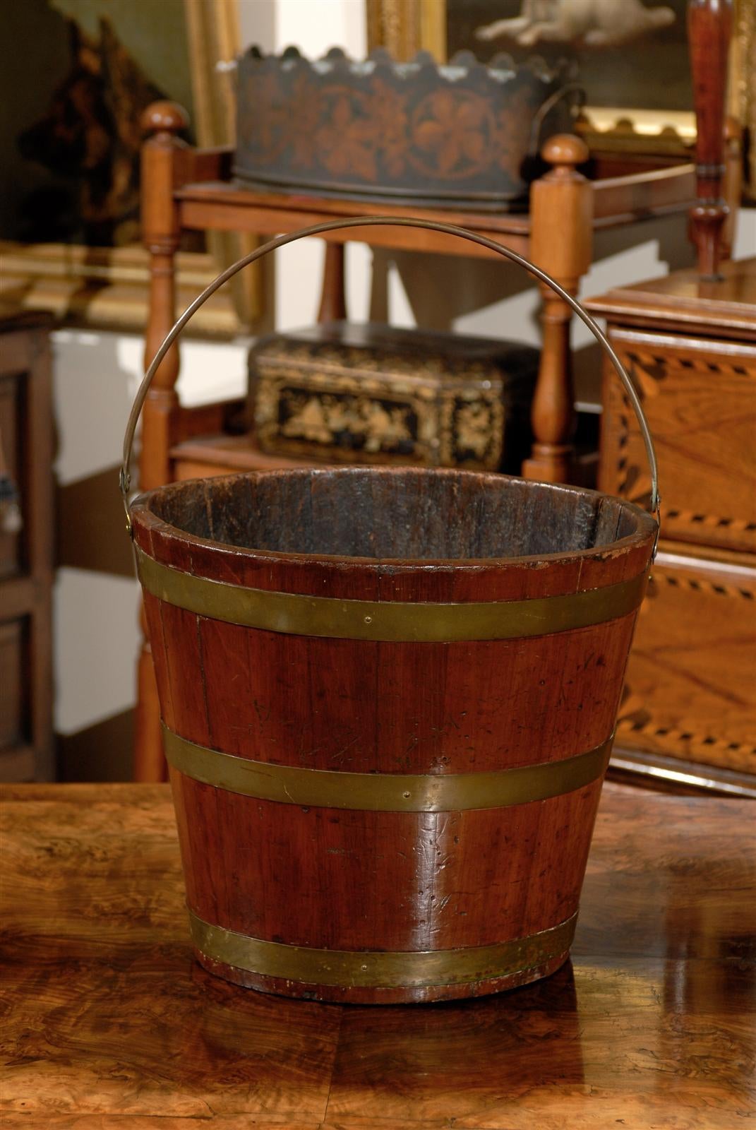 Oval wooden bucket with brass.