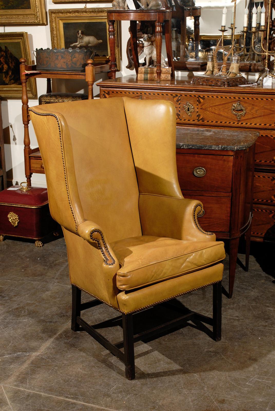 English leather wing chair in nice color.