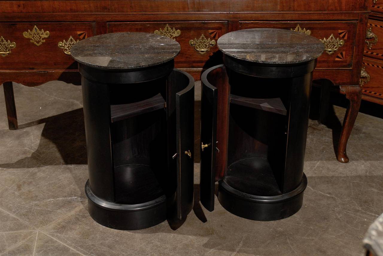 Pair of French Early 20th Century Ebonized Wood Column Tables with Marble Tops 1