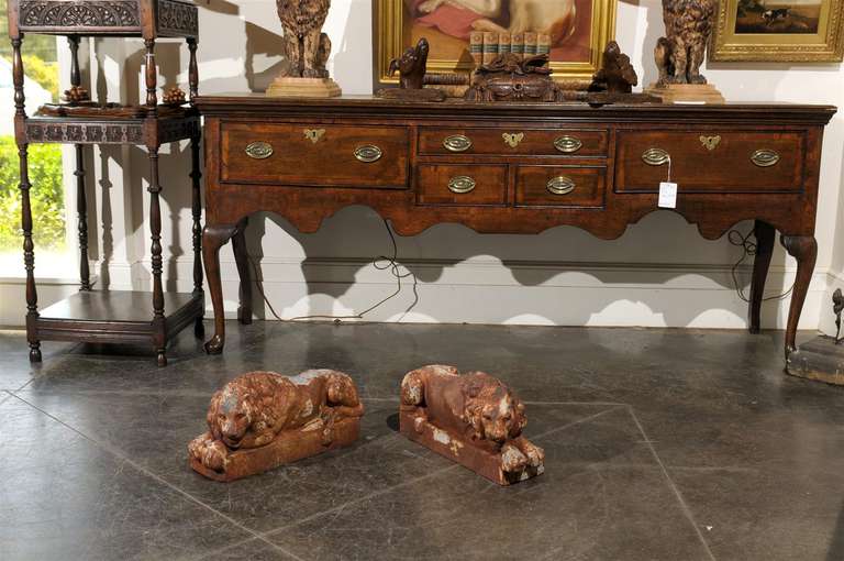 Pair of Petite French Patinated Iron Reclining Lions, Turn of the Century In Good Condition For Sale In Atlanta, GA