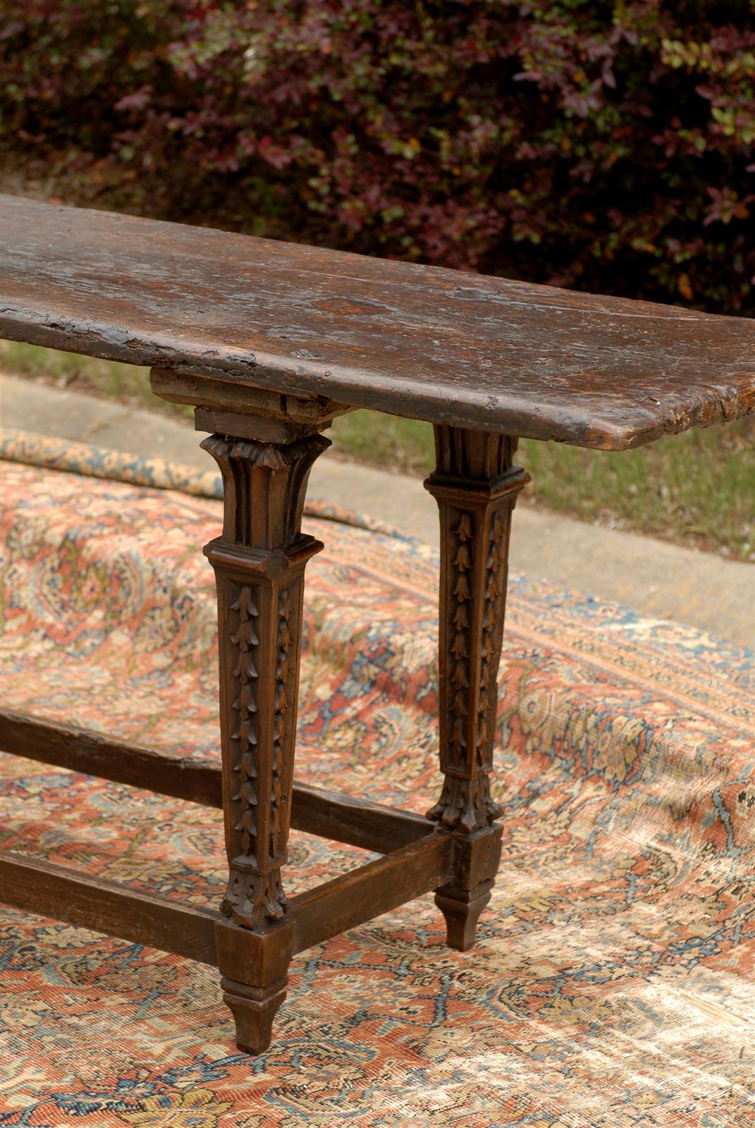 1700s Italian Baroque Long Table with Rustic Top and Garland Adorned Legs 2