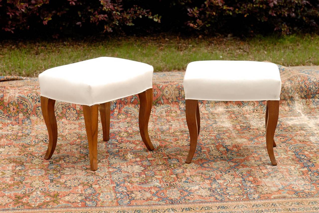 Pair of French upholstered stools. 
