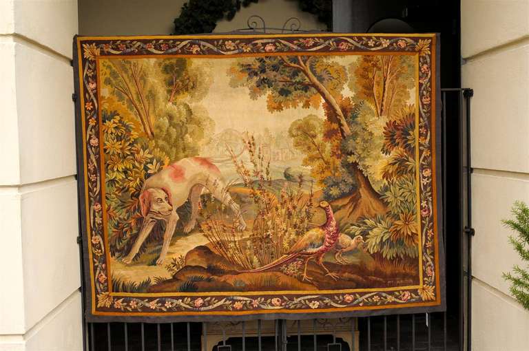 French tapestry with large sporting dog. Signed with initials.