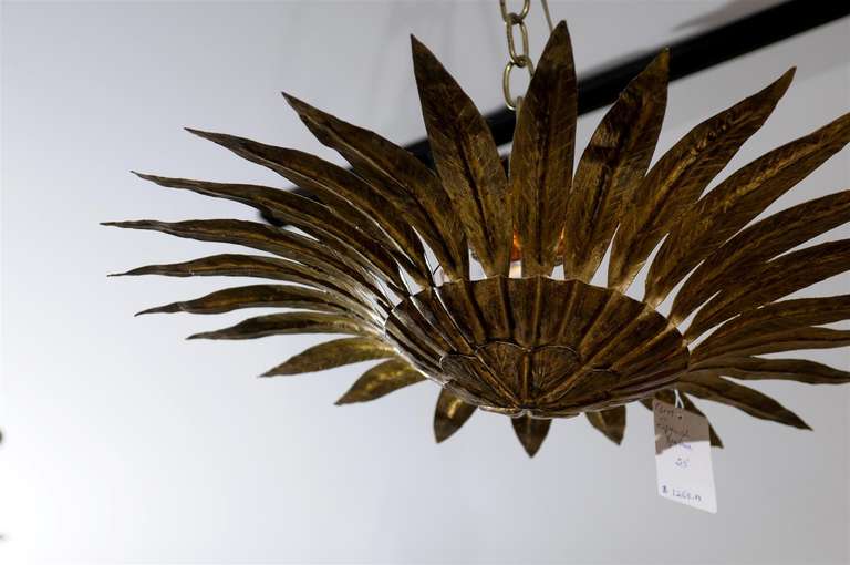 Spanish Semi-Flush Gilt Metal Sunburst Light Fixture with Carved Pointing Leaves In Good Condition In Atlanta, GA