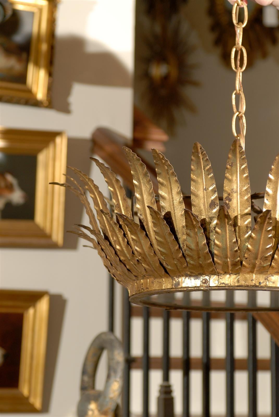 Mid-Century Modern Spanish Gilt Metal Crown Chandelier with Layered Leaves and Frosted Glass Bottom