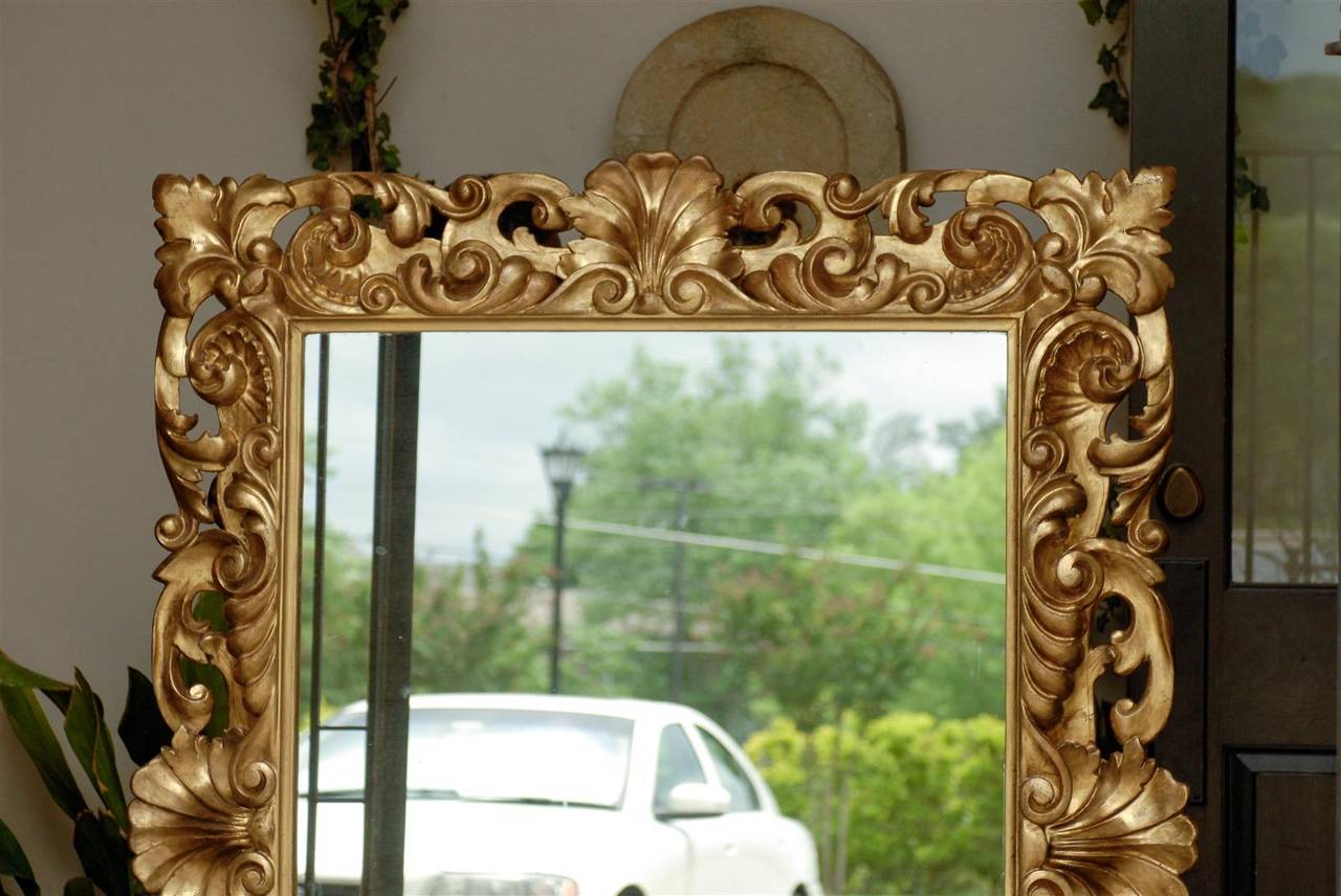 Italian Large Size Mirror with Carved Giltwood Frame from the Late 19th Century 1