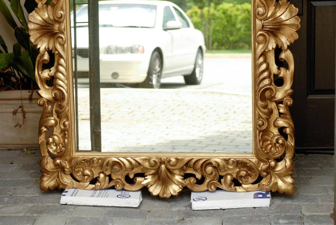 Italian Large Size Mirror with Carved Giltwood Frame from the Late 19th Century 5