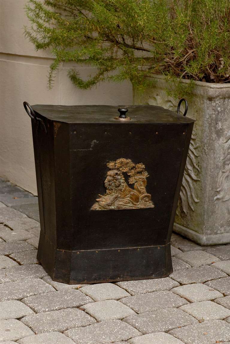 Large English tole coal hod with lion motif on front.