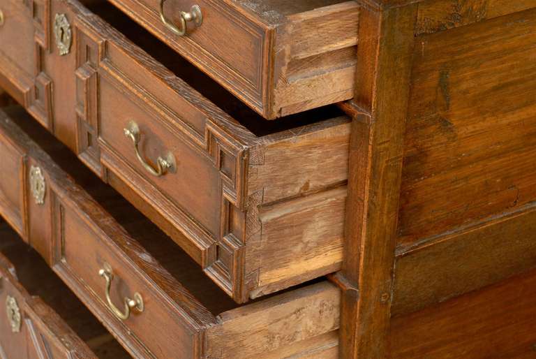English Early 19th Century Oak Geometric Front Four-Drawer Chest on Bracket Feet 3