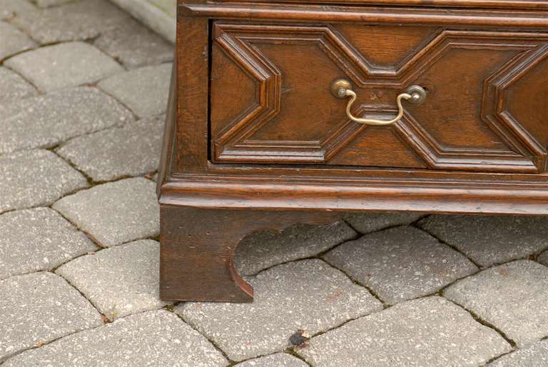 Brass English Early 19th Century Oak Geometric Front Four-Drawer Chest on Bracket Feet