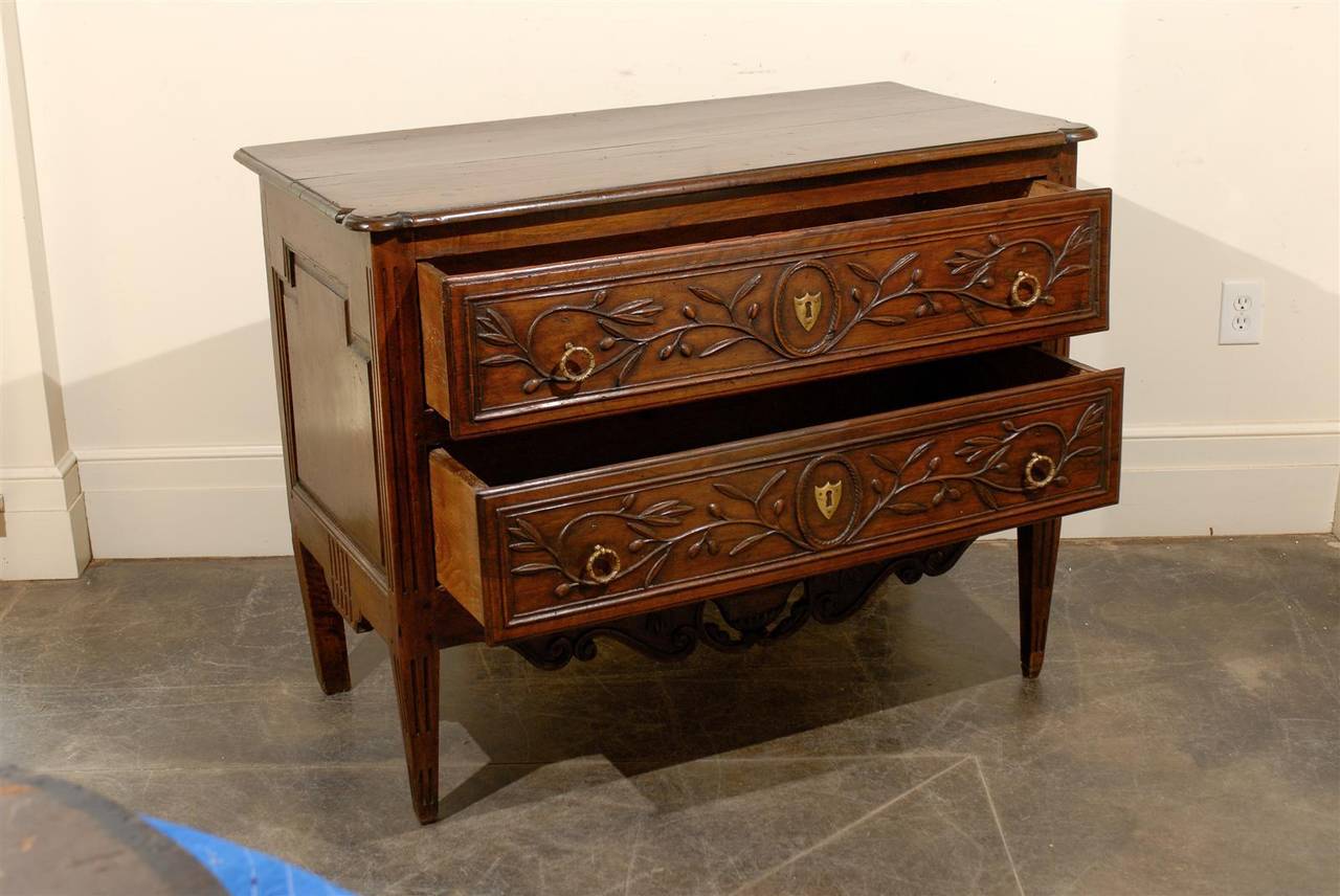 French Early 19th Century Two-Drawer Commode with Foliage Décor and Tapered Legs 1