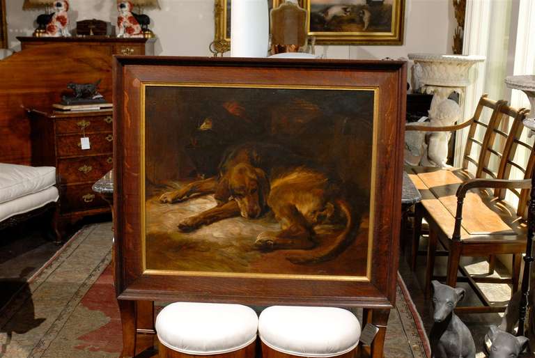 English dog painting of a hound in oak frame.