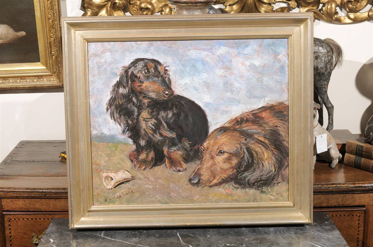Oil Painting of Dachshunds in gold frame.