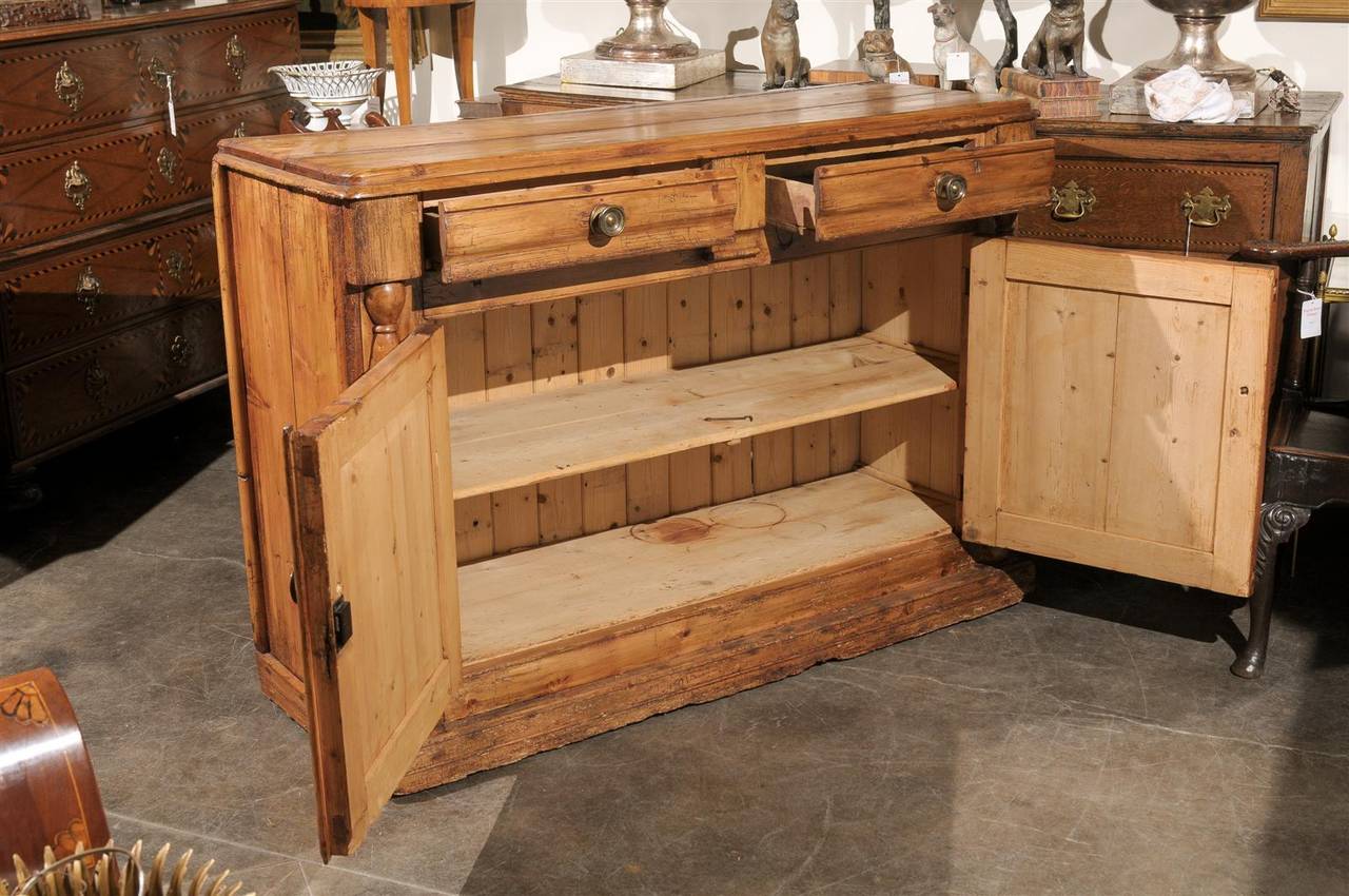 Pine Buffet from the Mid-19th Century with Two Drawers over Two Carved Doors In Good Condition In Atlanta, GA