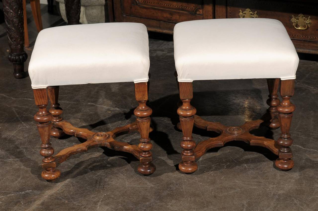 Pair of English Upholstered Walnut Stools with Carved Stretcher 1