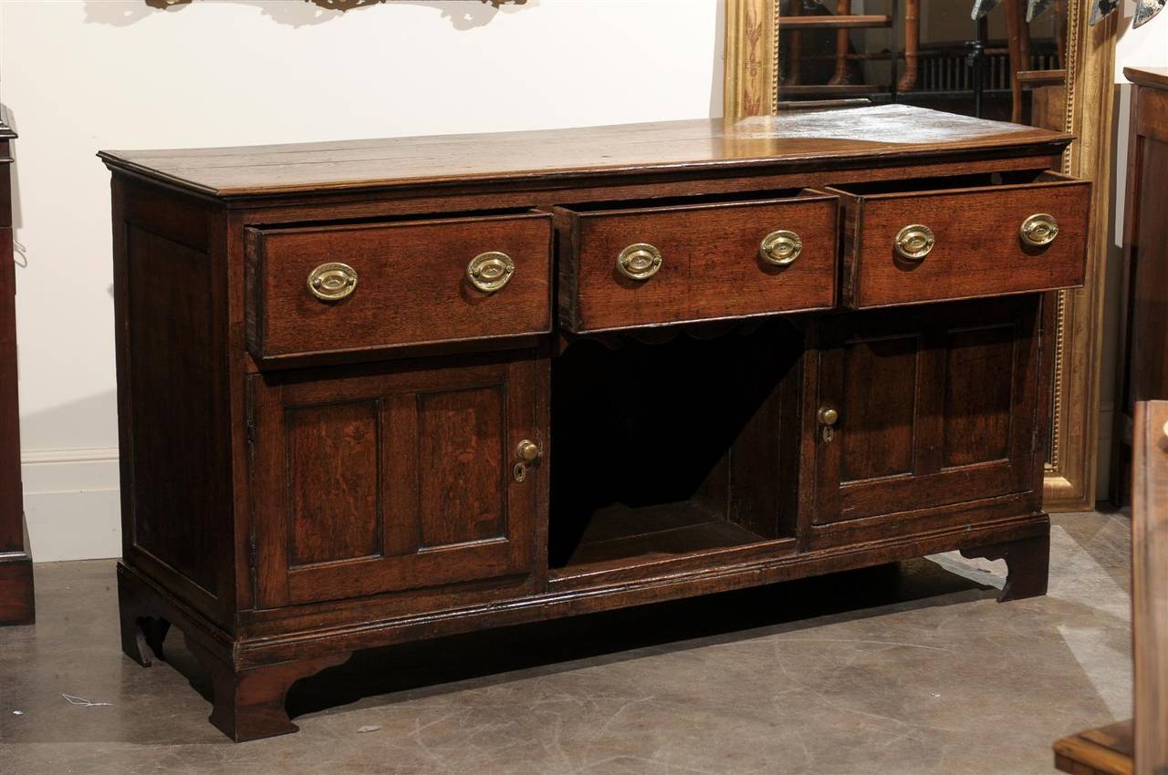 English Oak Dresser Base with Three Drawers over Two Doors and Shelf, circa 1800 4