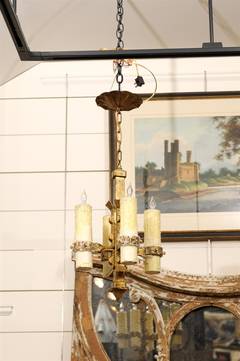 French Vintage Four-Light Gilt Iron Light Fixture with Large Wax Candles