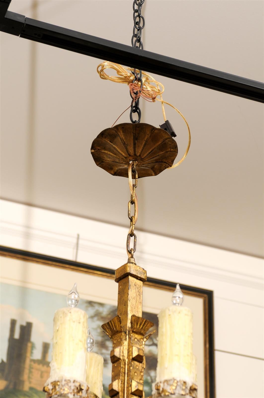 French Vintage Four-Light Gilt Iron Light Fixture with Large Wax Candles In Good Condition For Sale In Atlanta, GA