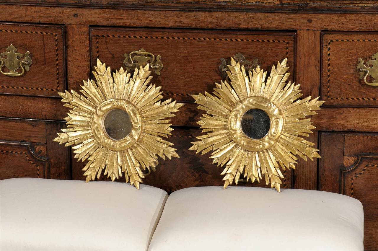 Pair of small gilt wood Sunburst mirrors.