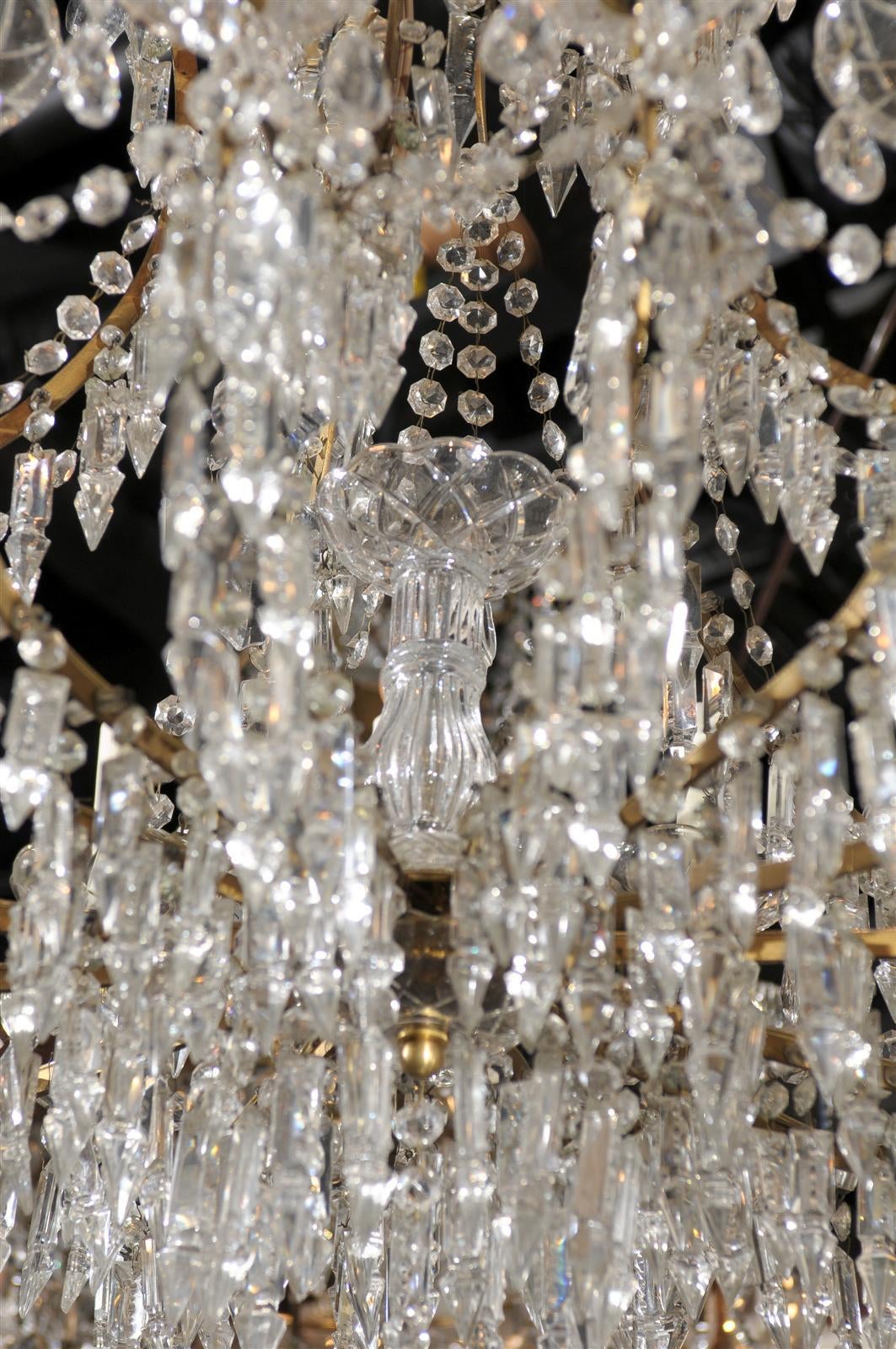 Gilt Metal French Fifteen-Light Crystal Louis XV Style Chandelier from Early 20th Century