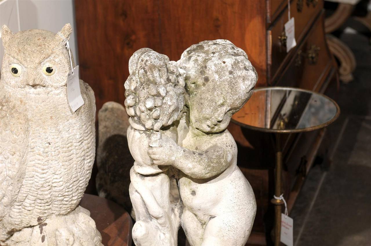 French Carved Stone Putti Sculpture with Grapes from the Mid 20th Century For Sale 4