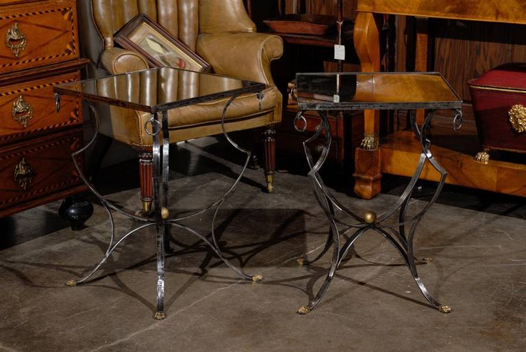 Pair of Deco mirror top tables of steel and brass.