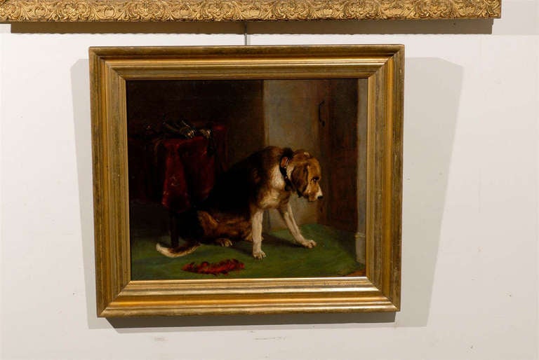 English dog oil on canvas in a rectangular gilt frame, painted in 1870 after Sir Edwin Henry Landseer’s painting entitled 'Suspense', in the collection of the Victoria and Albert Museum of London. A bloodhound propped on its front legs sits within