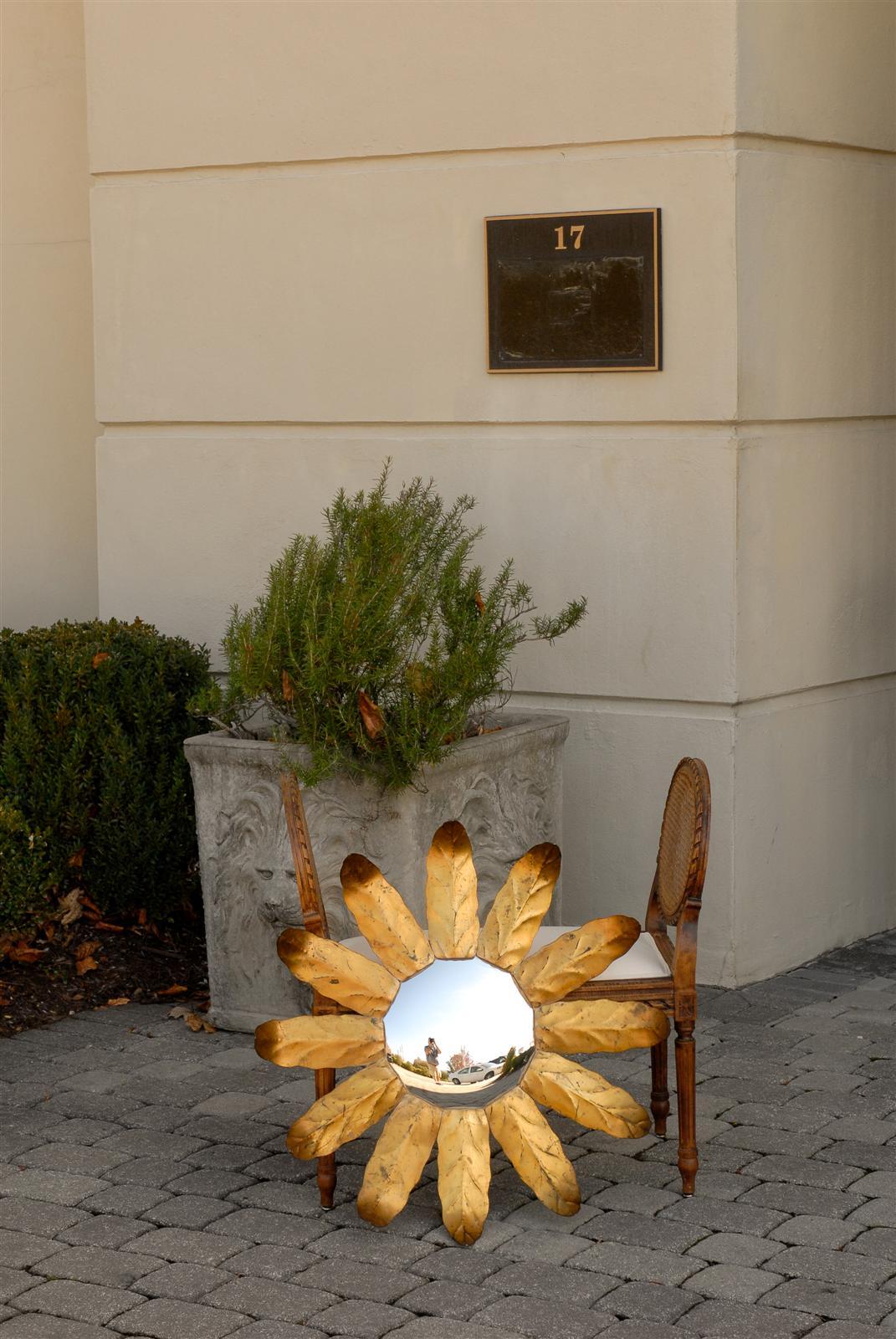 Mid-Century Modern 1940s Spanish Sunburst Mirror with Gilt Curving Metal Leaves and Convex Glass For Sale