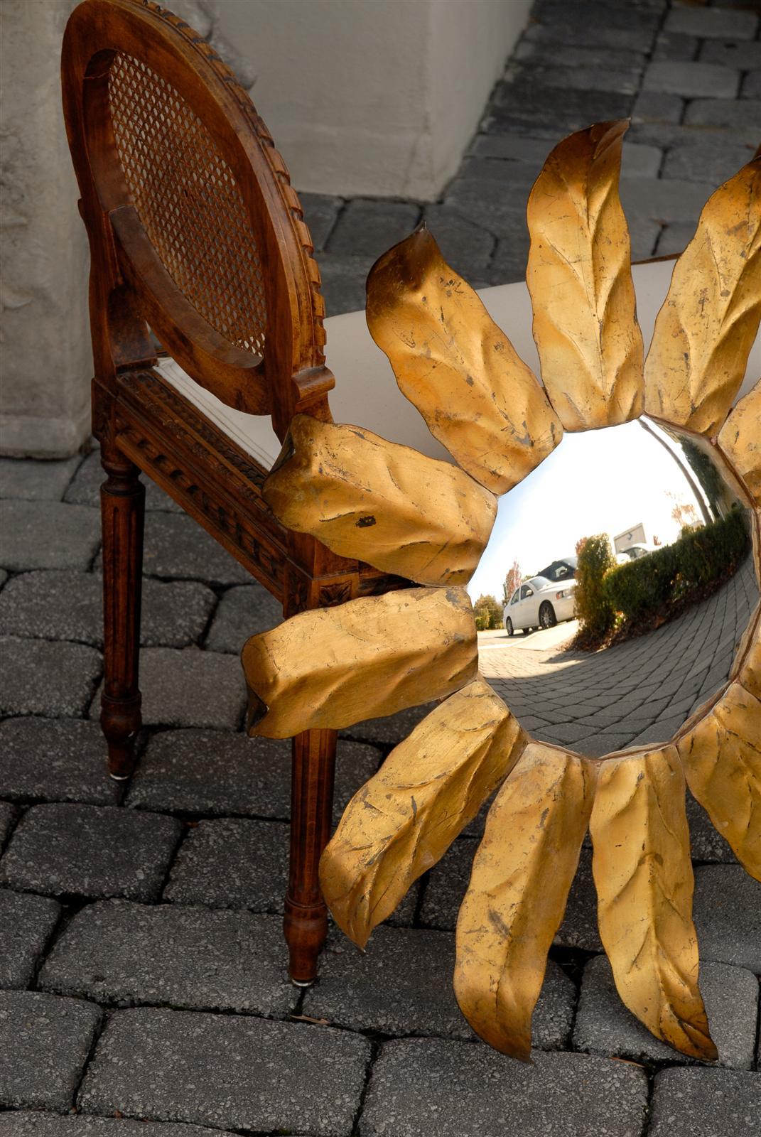 20th Century 1940s Spanish Sunburst Mirror with Gilt Curving Metal Leaves and Convex Glass For Sale