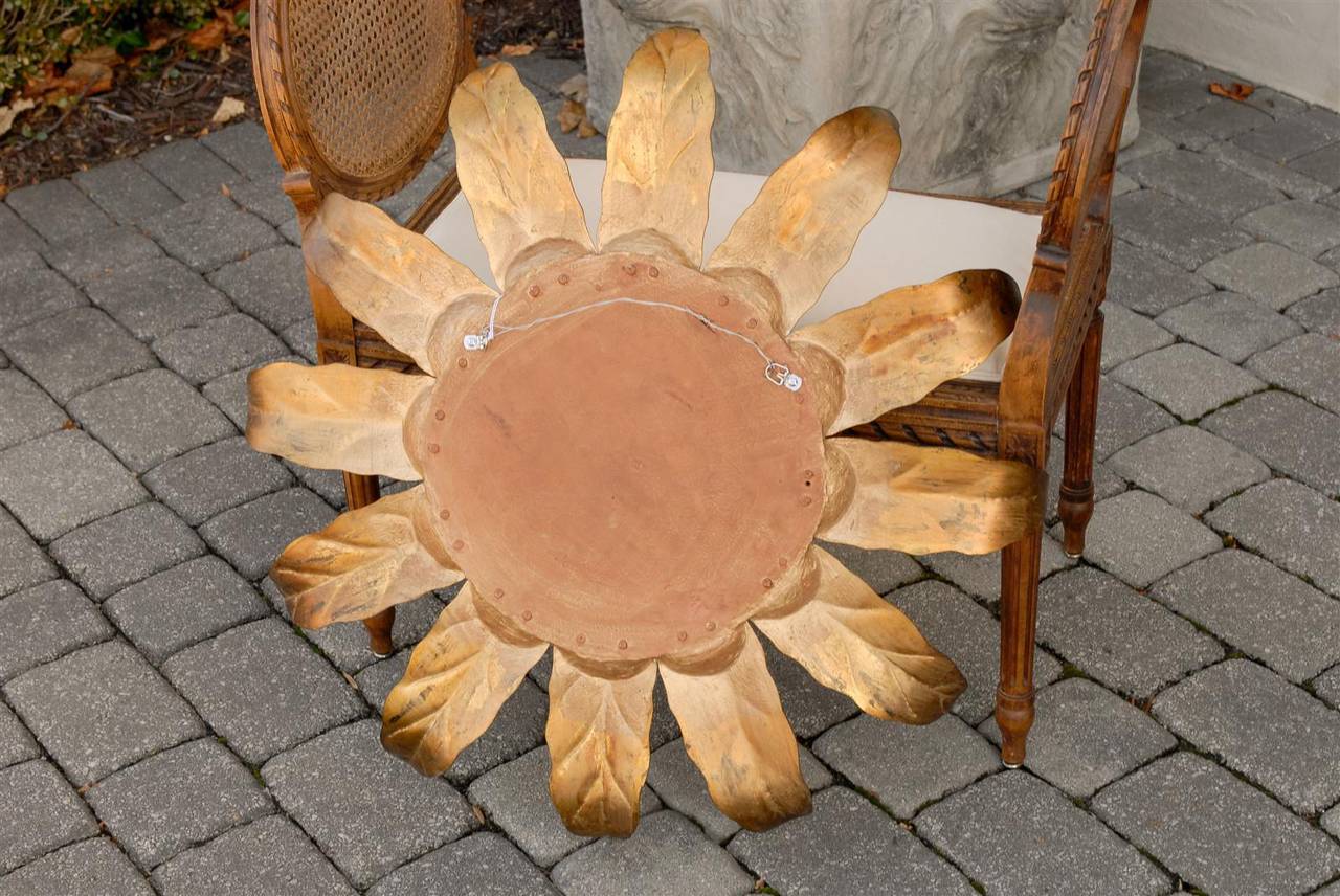 1940s Spanish Sunburst Mirror with Darkened Gilt Metal Leaves and Convex Glass In Good Condition For Sale In Atlanta, GA