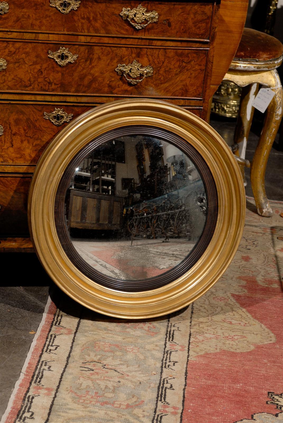 19 th.c. English gilt wood convex mirror .