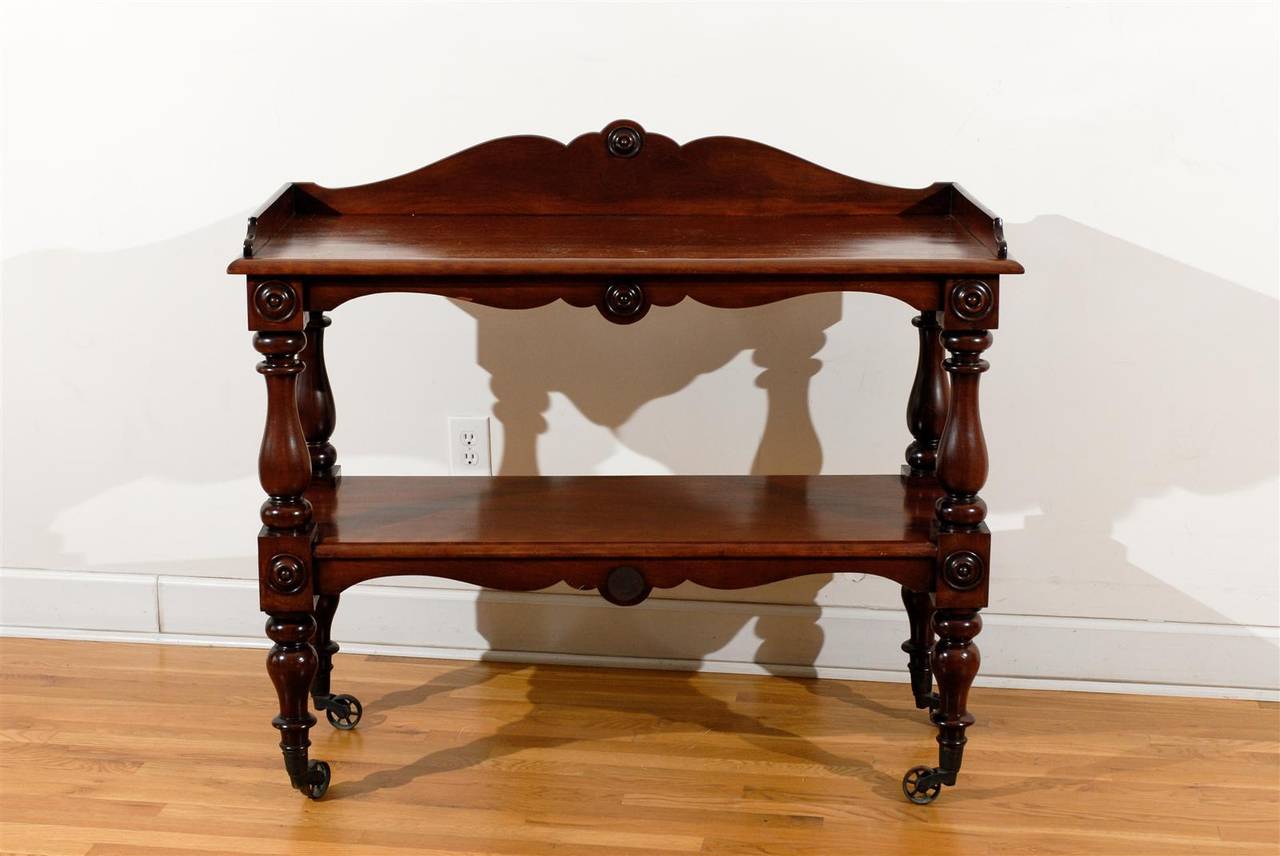 English 1840s Wooden Two Tiered Trolley With Turned Legs And Large English 1840s wooden two tiered trolley with turned legs and large