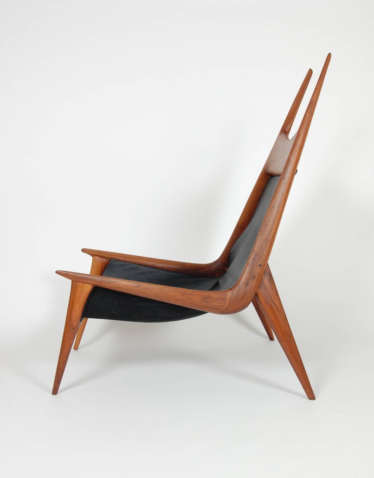 Studio craft lounge by Bay Area woodsmith Miles Karpilow, impressive scale and form, created out of an richly hued walnut with leather upholstery.