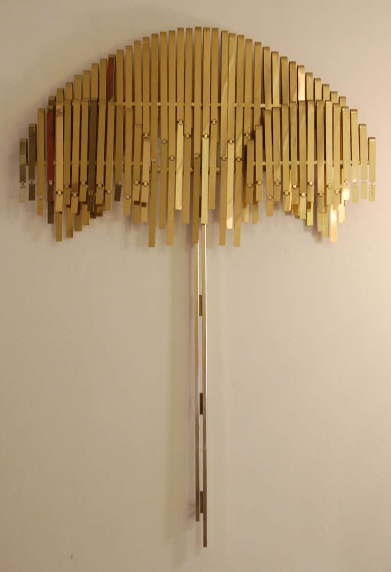 Wall hanging sculpture by Jere depicting a weeping willow in metal. The front bottom pieces are hinged which creates movement when touched or by a breeze crossing the room.  