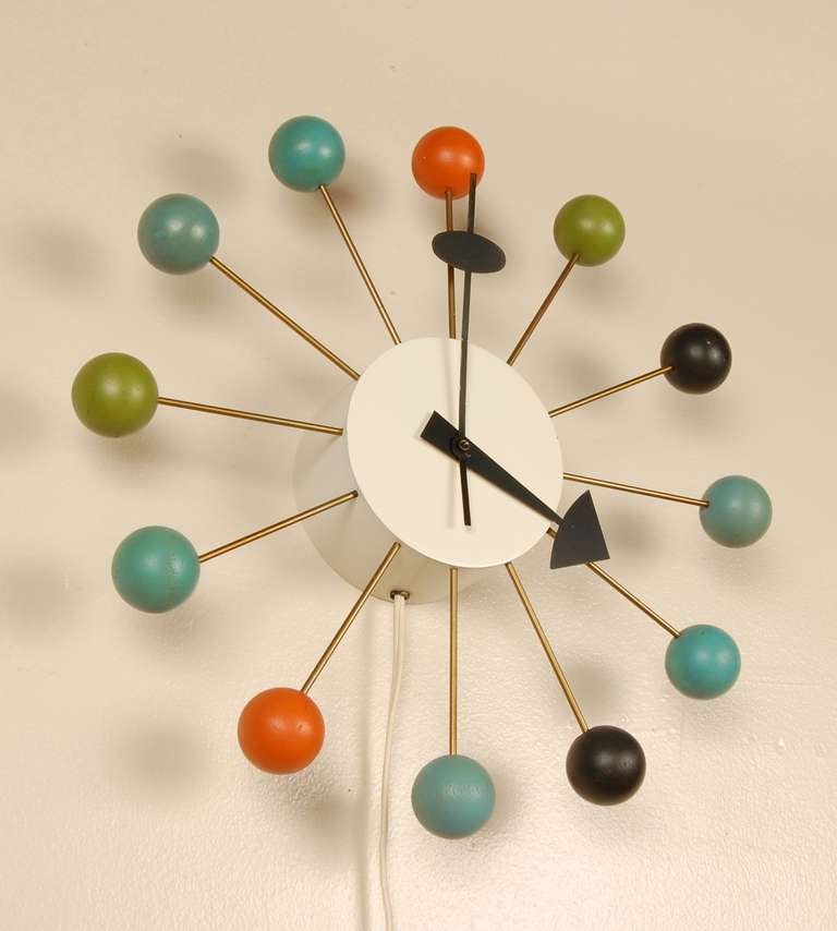 An exceptional example of a George Nelson multicolored ball clock for Howard Miller. Completely original, looks near perfect along with quite and accurate operation.