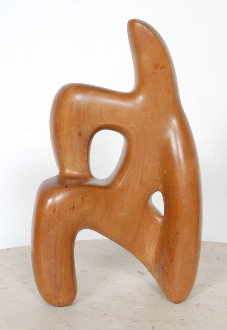 Wooden figurative sculpture by Carroll Barnes (1906-1997). Barnes went to the Corcoran School of Art in Washington D.C., he was awarded an National Scholarship to Study with Carl Milles at Cranbrook Academy of Art in Bloomfield Hills Michigan.  He
