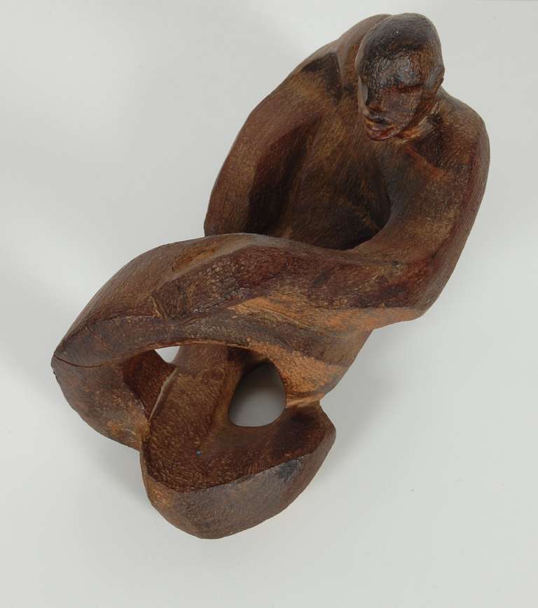 Craved wood figurative abstract sculpture of the male form, great age and patina to the piece, created during the 1940's. The creator of this piece is unknown, however the form and craft of the piece was by an proficient hand.