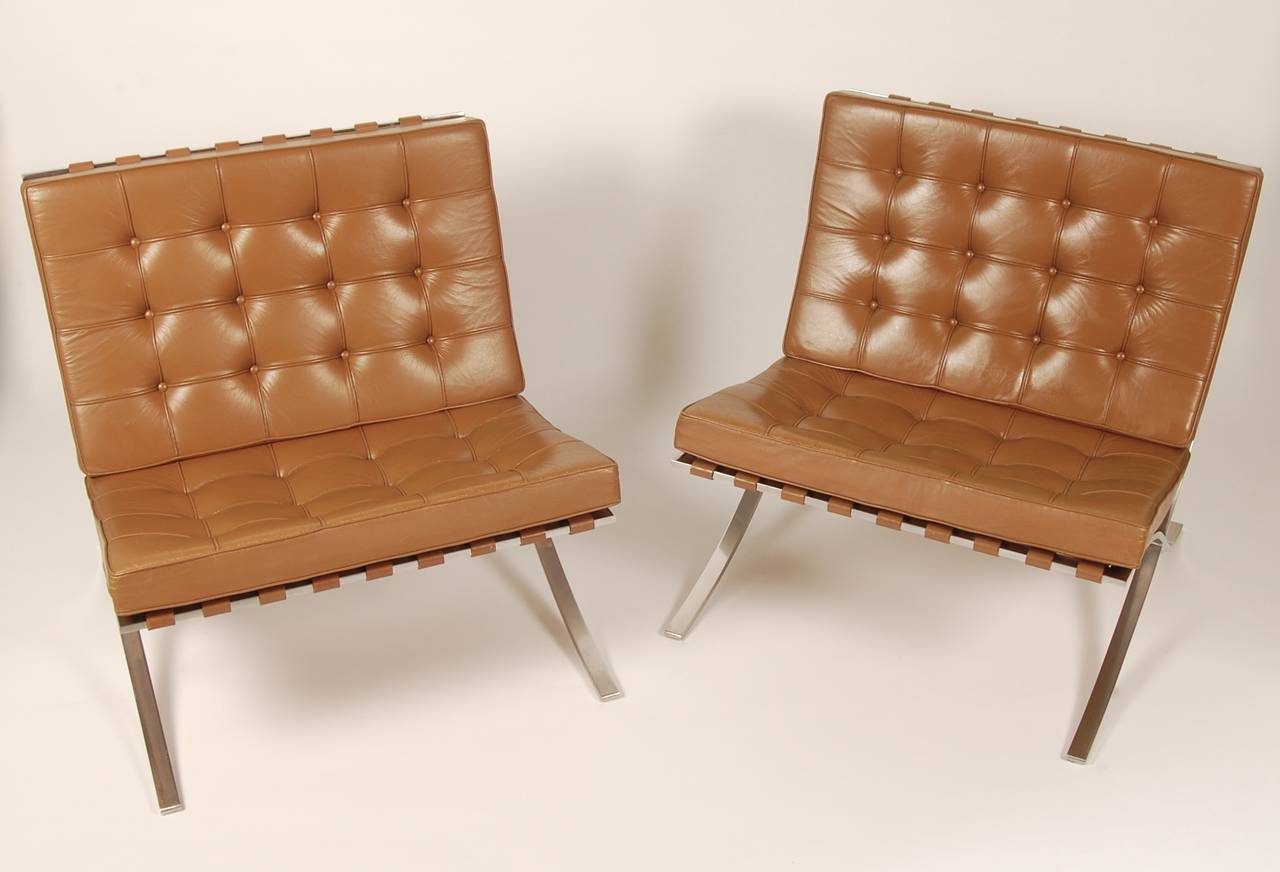 Designed for the Barcelona Pavillion in 1929 for the Indernational Expostion in Spain by Mies van der Rohe and Lilly Reich. 1960s production Barcelona lounges in tan leather with stainless steel frames. Obtained from the second owner who purchased