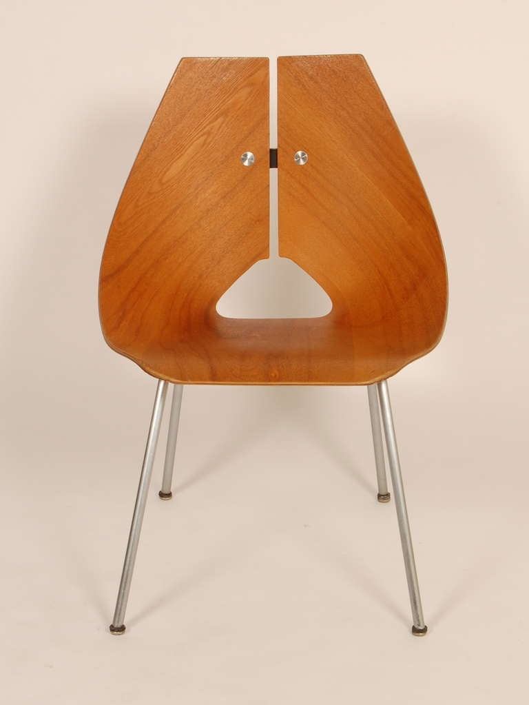 Created out of a single piece of molded plywood is this side chair designed by Ray Komai for JG Furniture in 1949. After his interment from Manzanar, Komai went to Brooklyn and started a successful design firm that worked in several disciplines.