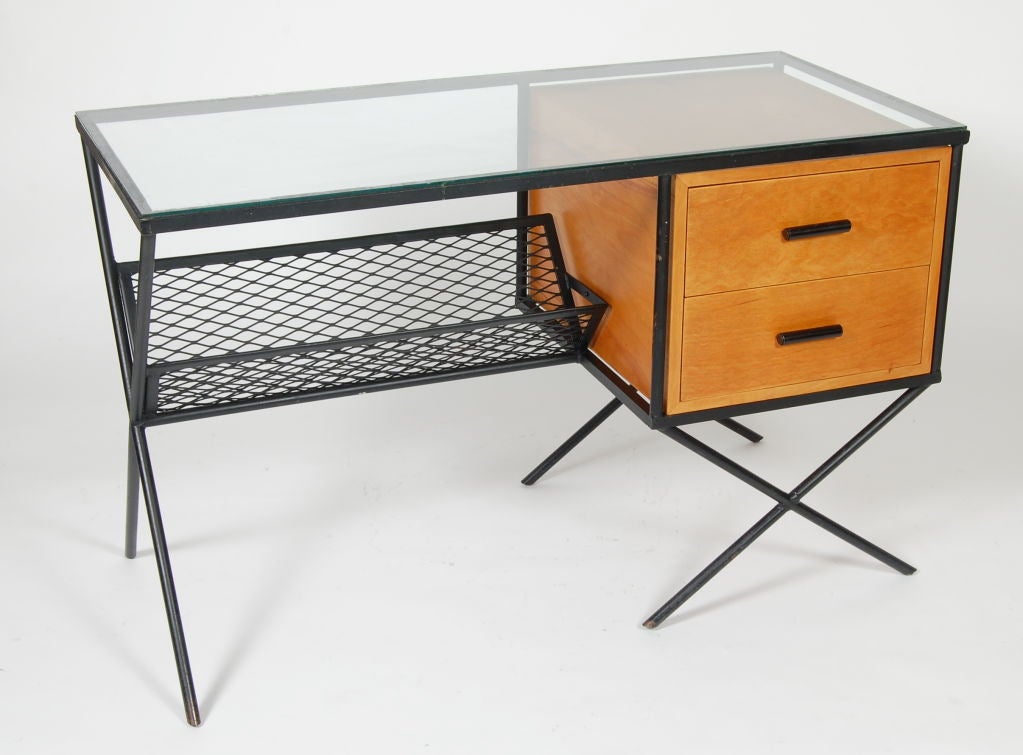 Muriel Coleman desk with glass top, a birch two drawer cabinet and a expanded metal storage area below. This was one of her most successful designs for Coleman's company 