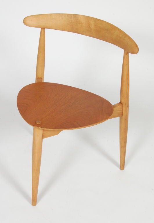 Three legged teak and beech dining / side chair 4103 circa 1952 by Hans Wegner for Fritz Hansen.