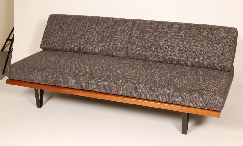 Mel Bogart for Felmore daybed / sleeper, the bottom cushion slides out to accommodate one guest. Walnut and wrought iron frame. New upholstery and foam. Labeled on the underside of the frame.